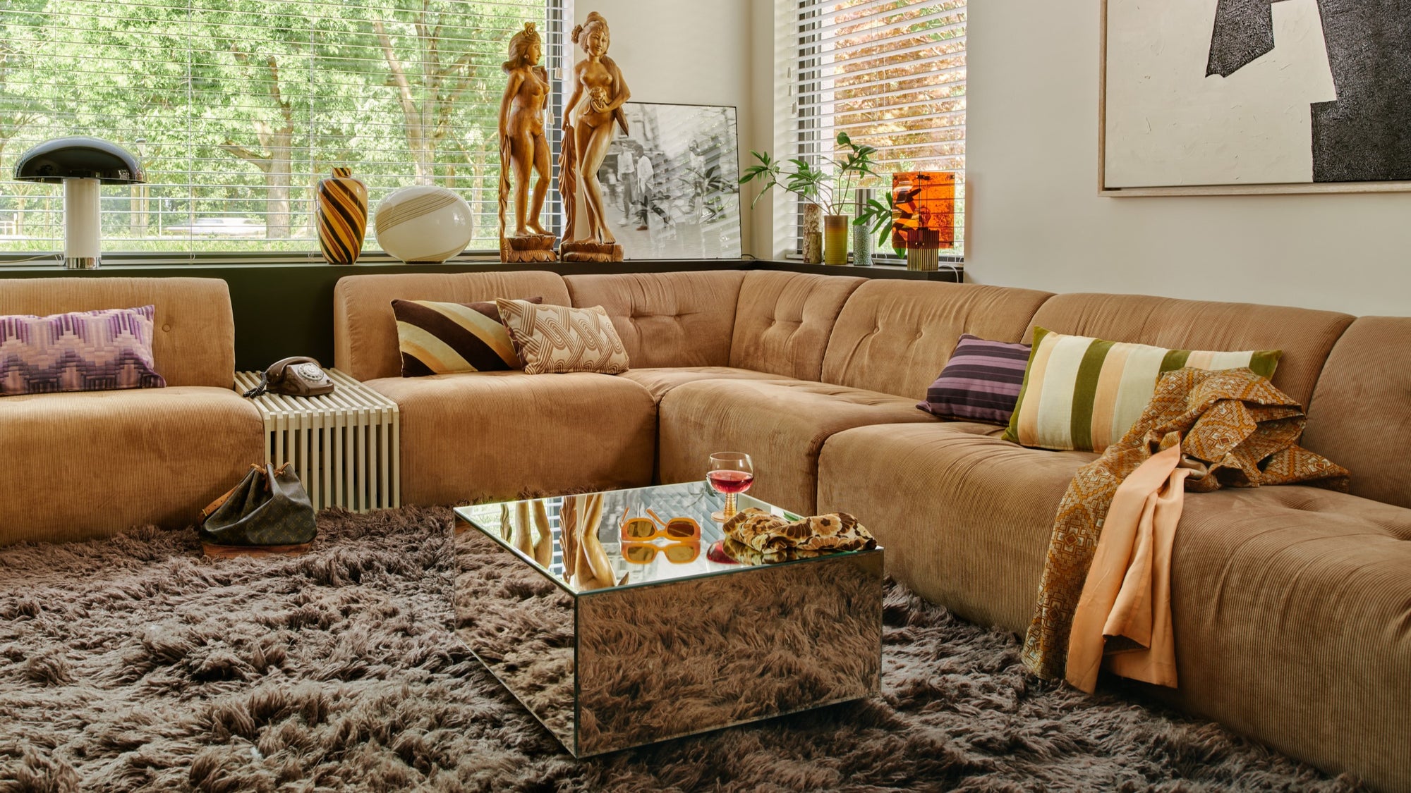 modern living room with velvet sofa in gold color