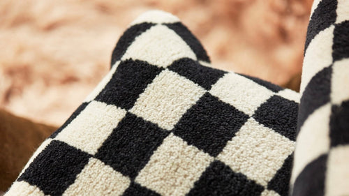 checkered black and white pillow