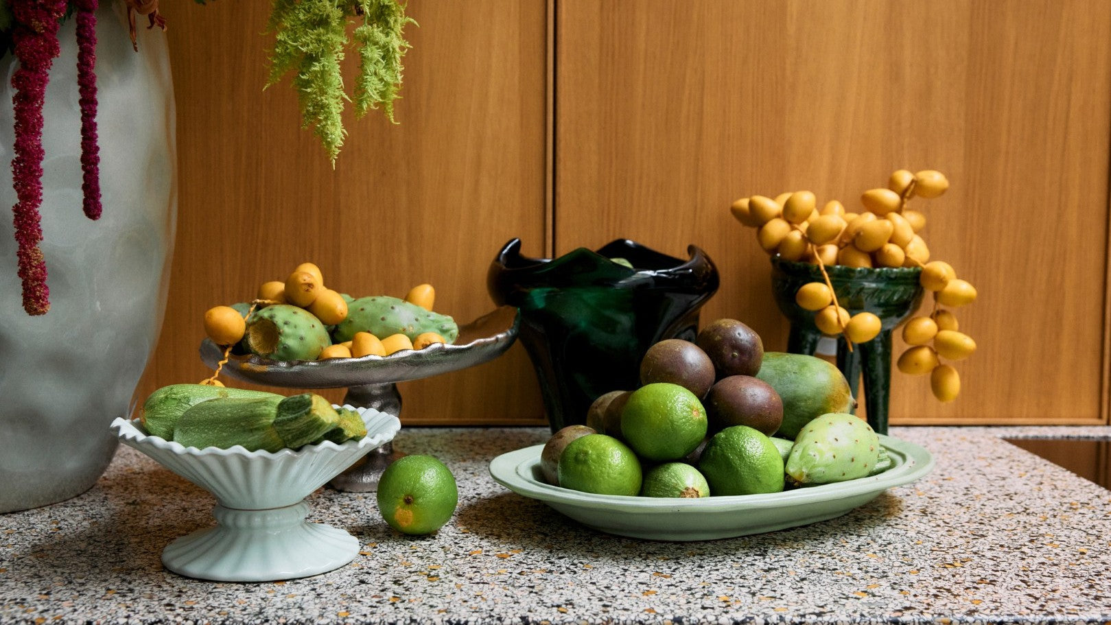 bowls and platters filled with fruit