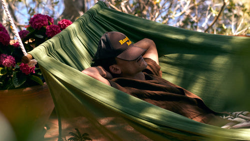 Christmas tree in red and white with whipped cream and cinnamon sticks 