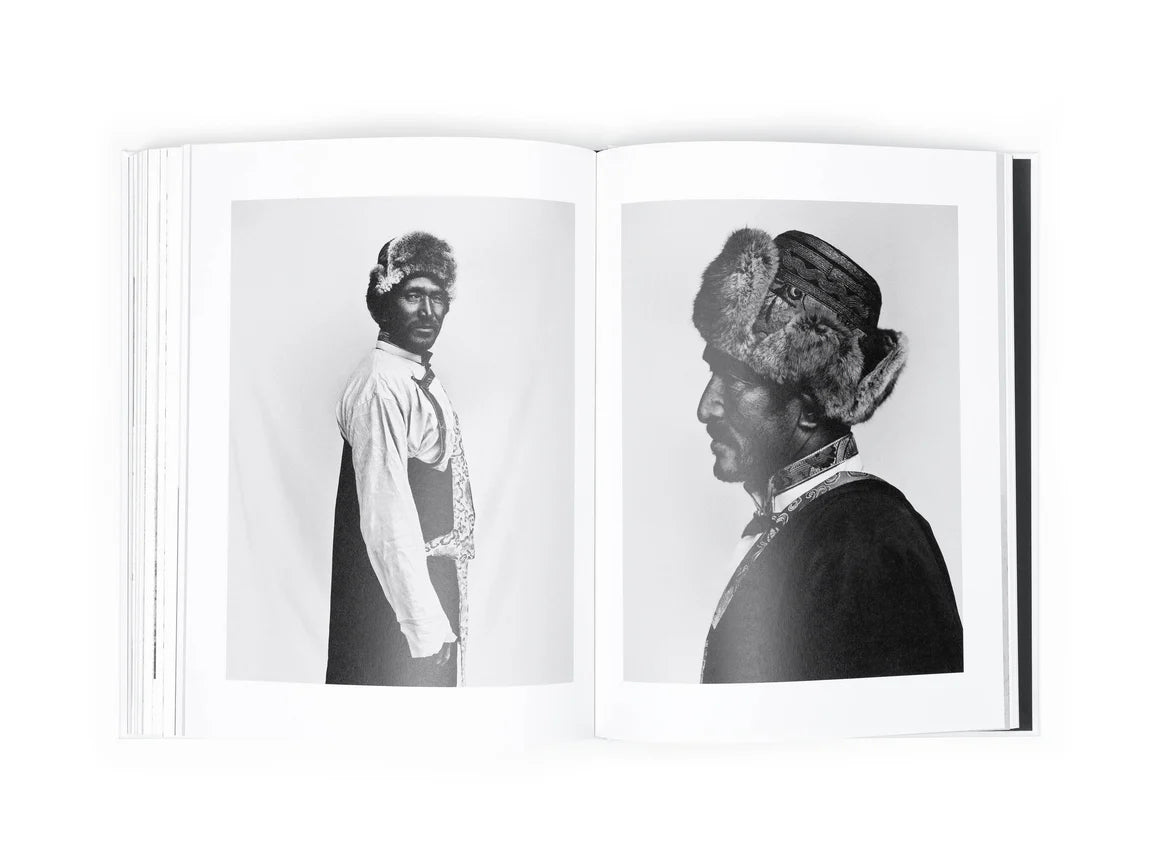 open book showing portraits of a Nepalese man