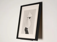 wall stand with framed artwork on white background