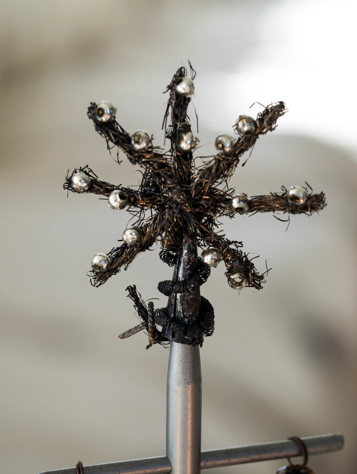 tinsel star metal tree topper with silver beads