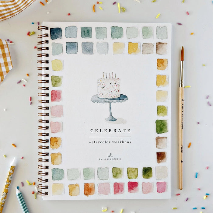 paper water coloring book with cake stand and the word celebrate