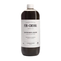 Fer a Cheval liquid black soap bottle on a white background