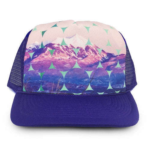 Trucker hat with mountain and circle pattern on a white background
