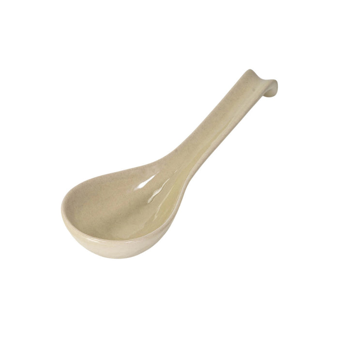 Beige ceramic spoon on a white background