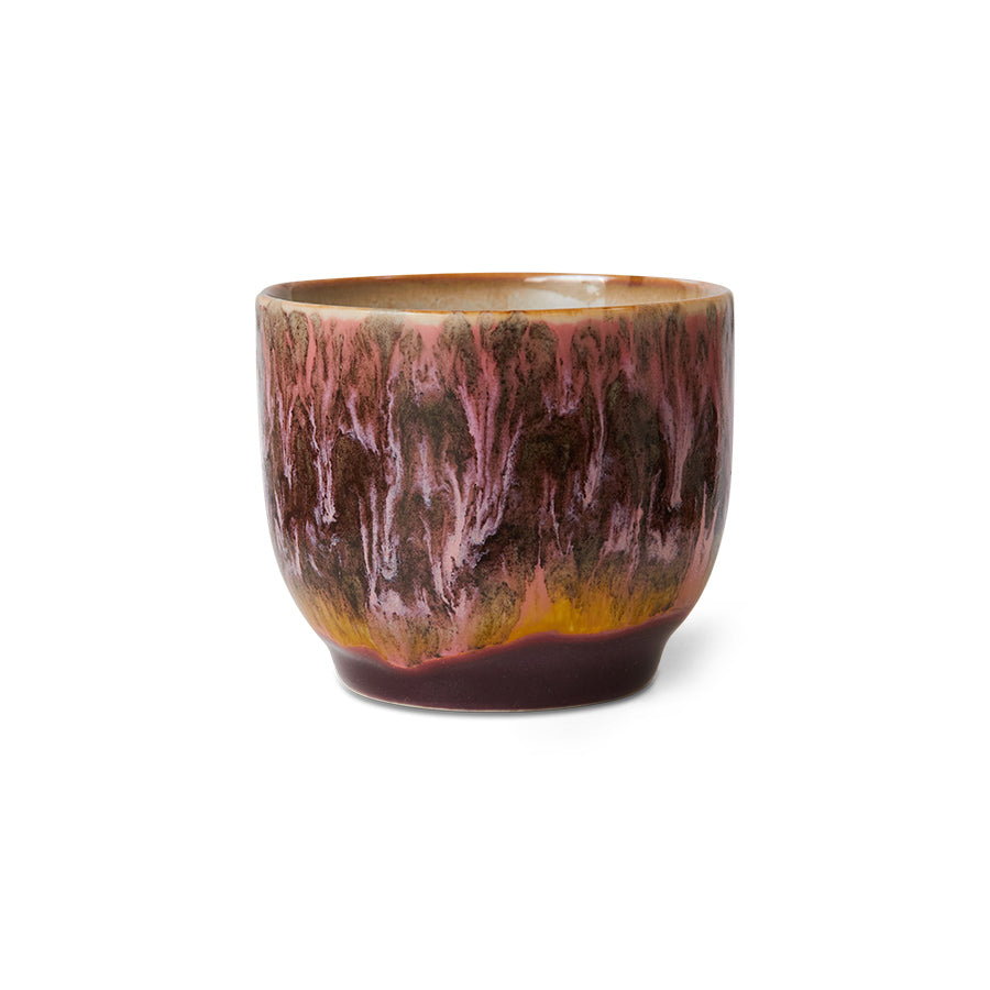 Ceramic cup with marbled design on a white background