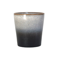 Ceramic mug with gradient gray and black design on a white background