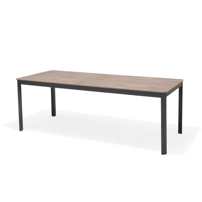 Rectangular table with wooden top and black metal legs on a white background