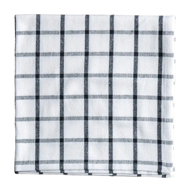 Plaid fabric with black and white pattern on a white background