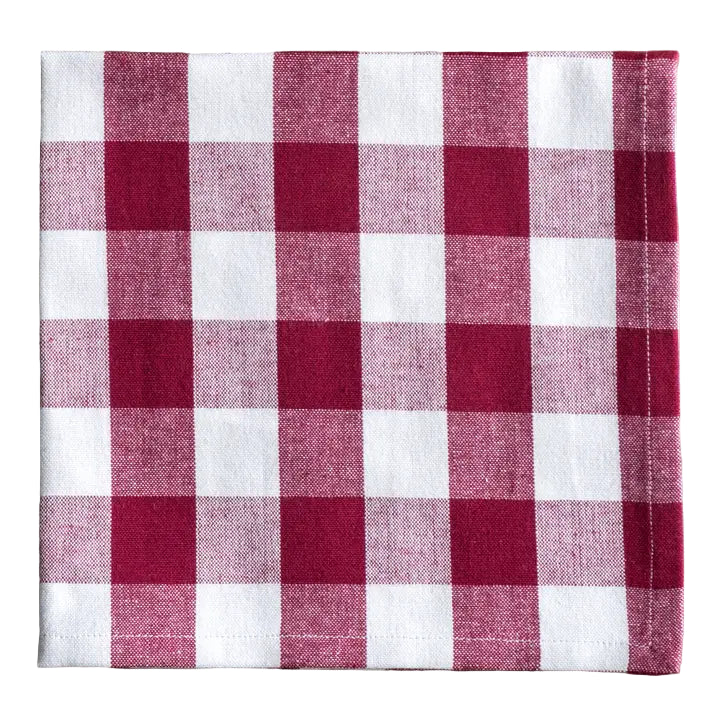 Red and white checkered fabric napkin on a white background