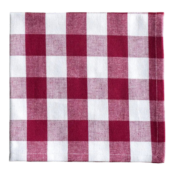 Red and white checkered fabric napkin on a white background