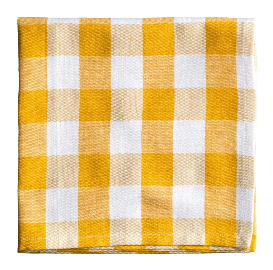 Yellow and white checkered fabric on a white background