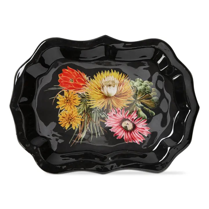 black glossy metal trinket tray with yellow and red and pink flowers on a white background