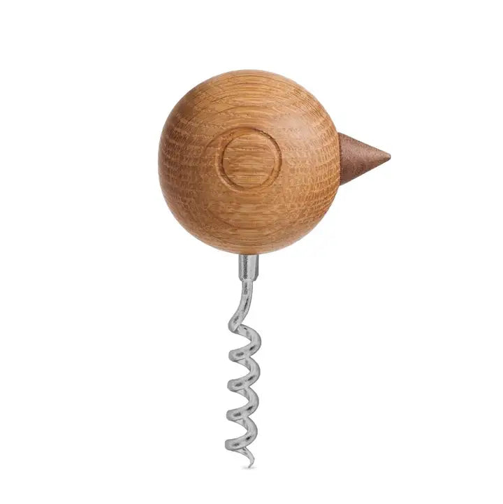 metal corkscrew with a Nordic style wooden head of bird on white background