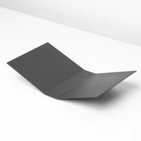 black metal book display stand on white background