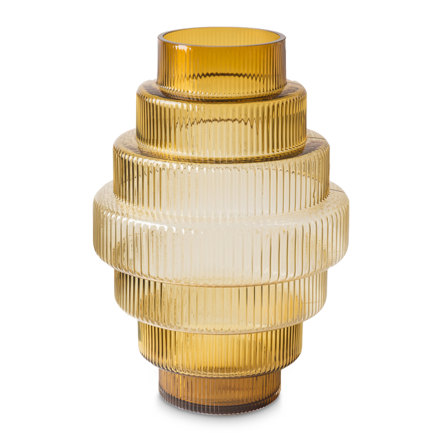 amber colored glass vase with steps