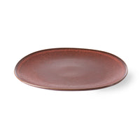 Brown ceramic plate on a white background