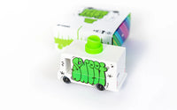 Small white toy truck with green accents on a white background
