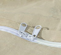 white zipper in beige duvet cover