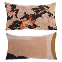 Two decorative pillows with floral and abstract patterns on a white background