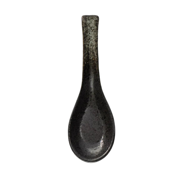 Black ceramic spoon on a white background