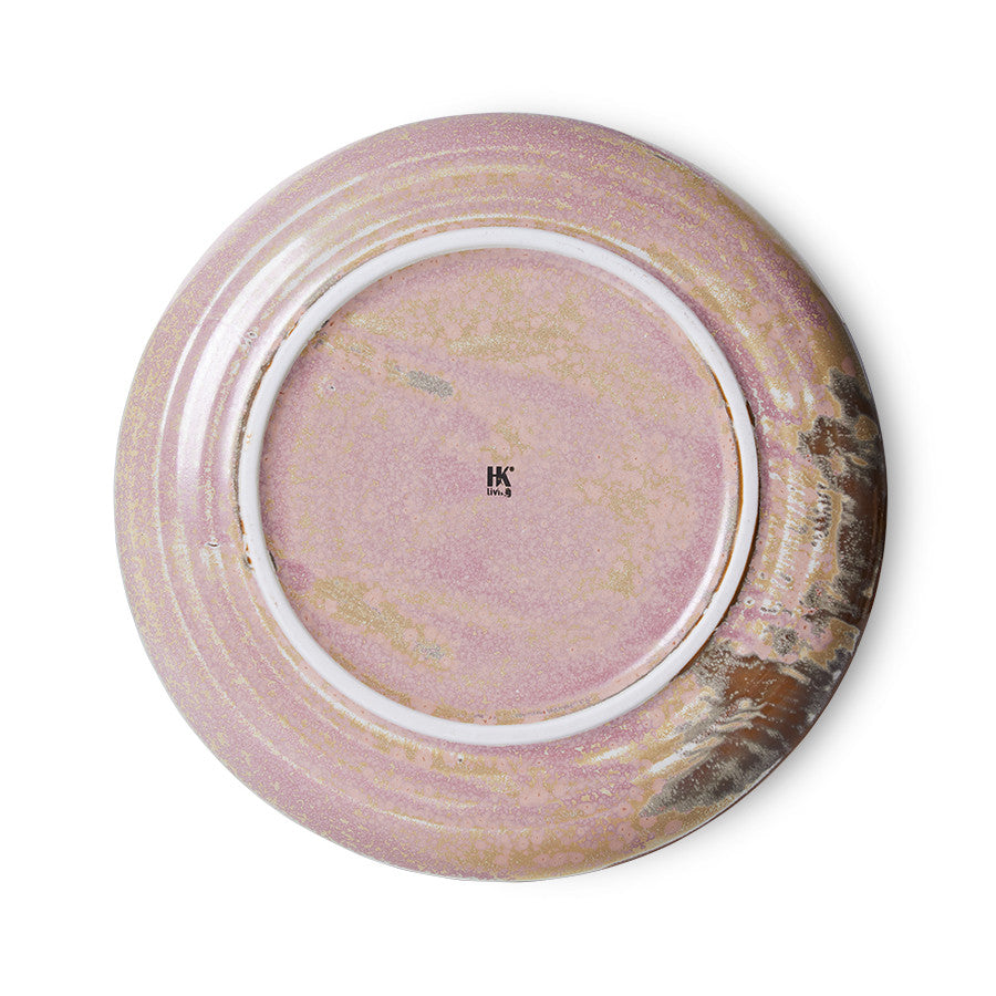 Pink and brown ceramic plate with a visible brand logo on a white background