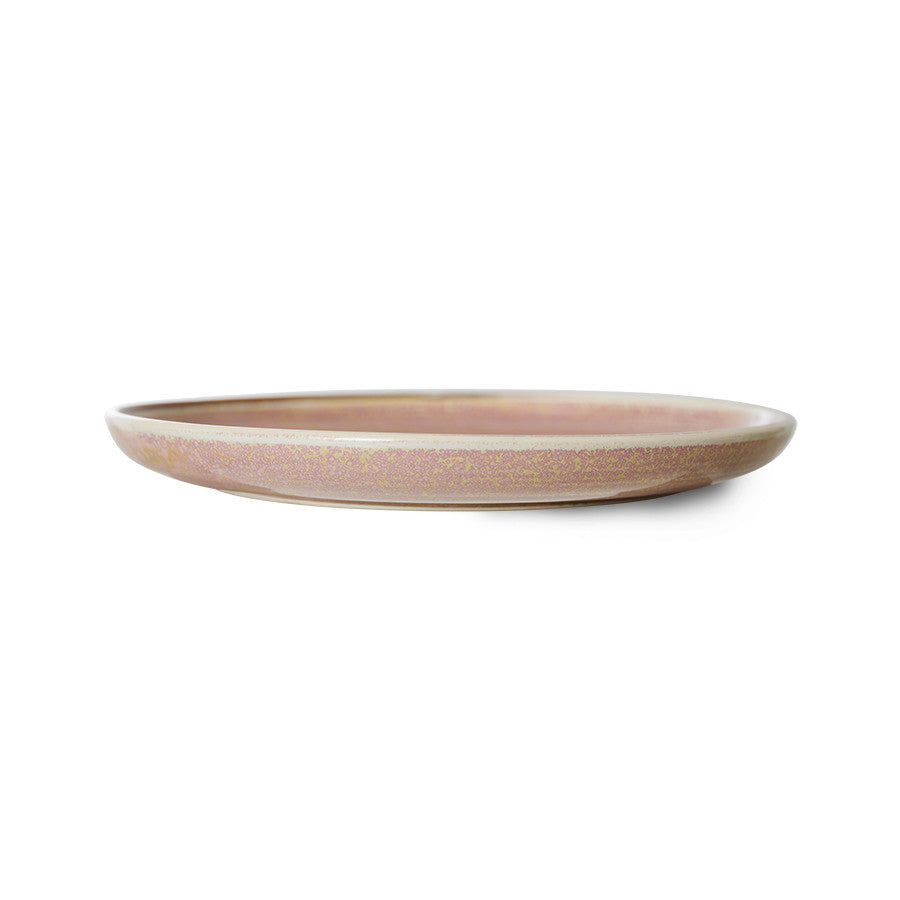 Pink ceramic plate on a white background