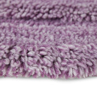 detail rund high and low pile tufted lilac rug
