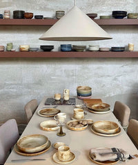 table setting with cream brown tableware
