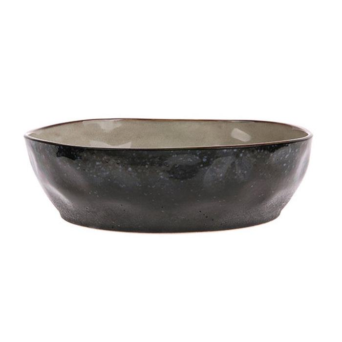 Black ceramic bowl on a white background