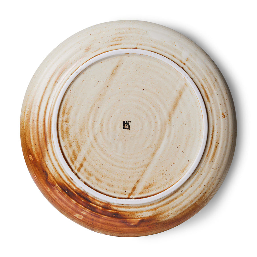 Ceramic plate with brown glaze and a logo on a white background