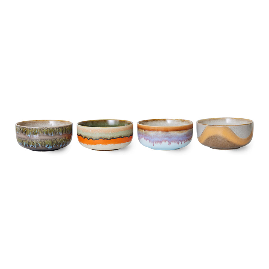 Set of four ceramic bowls with multicolored glazes on a white background