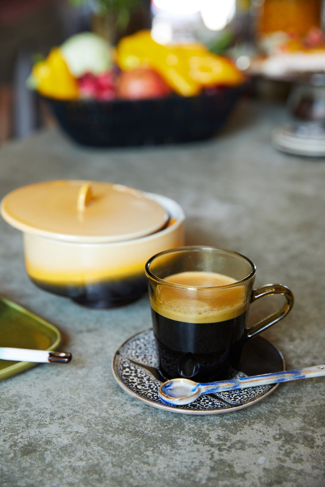 Espresso cup with a ceramic spoon on a table