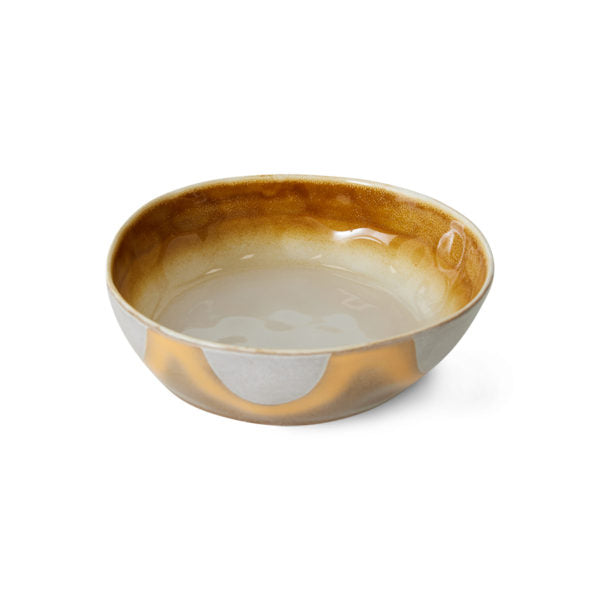 Ceramic bowl with brown and beige gradient on a white background