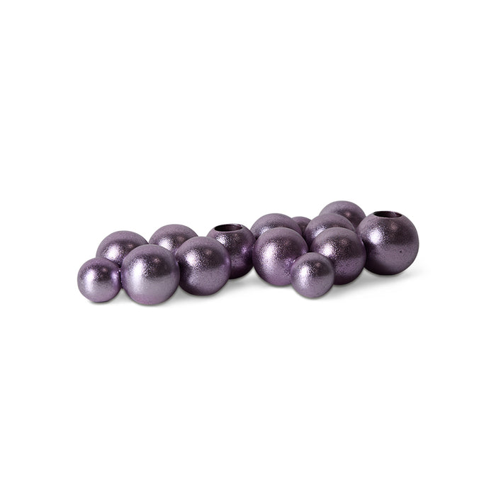 Purple beads on a white background