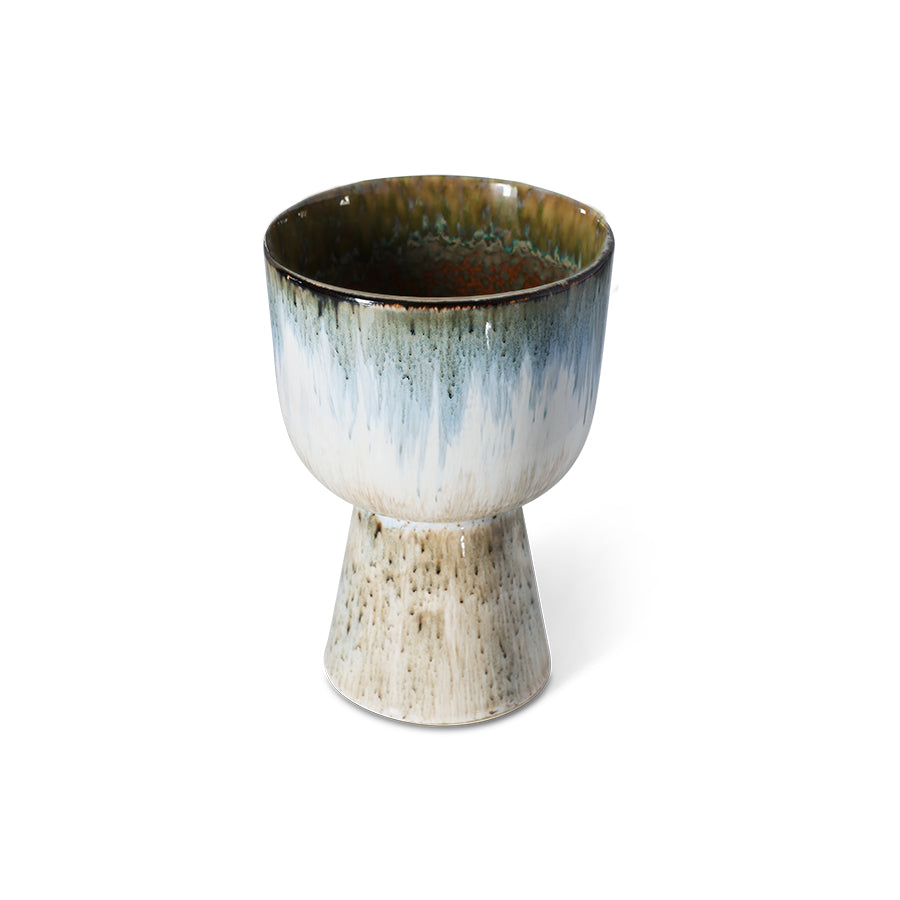 ceramic flower pot in blue and brown tones on a white background