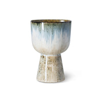 ceramic flower pot in blue and brown tones on a white background