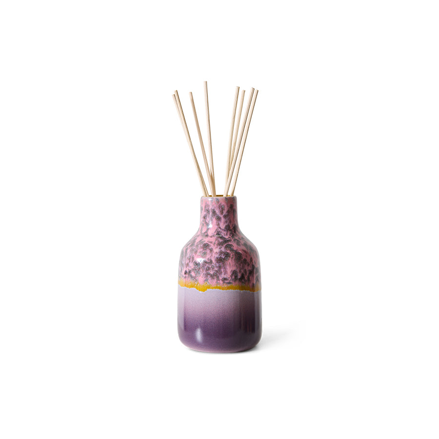 Decorative bottle with a unique design on a white background