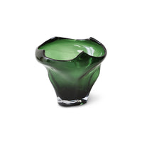 Green glass vase on a white background