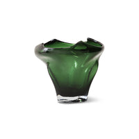 Green glass vase on a white background