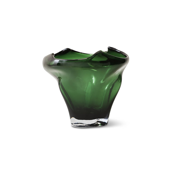 Green glass vase on a white background
