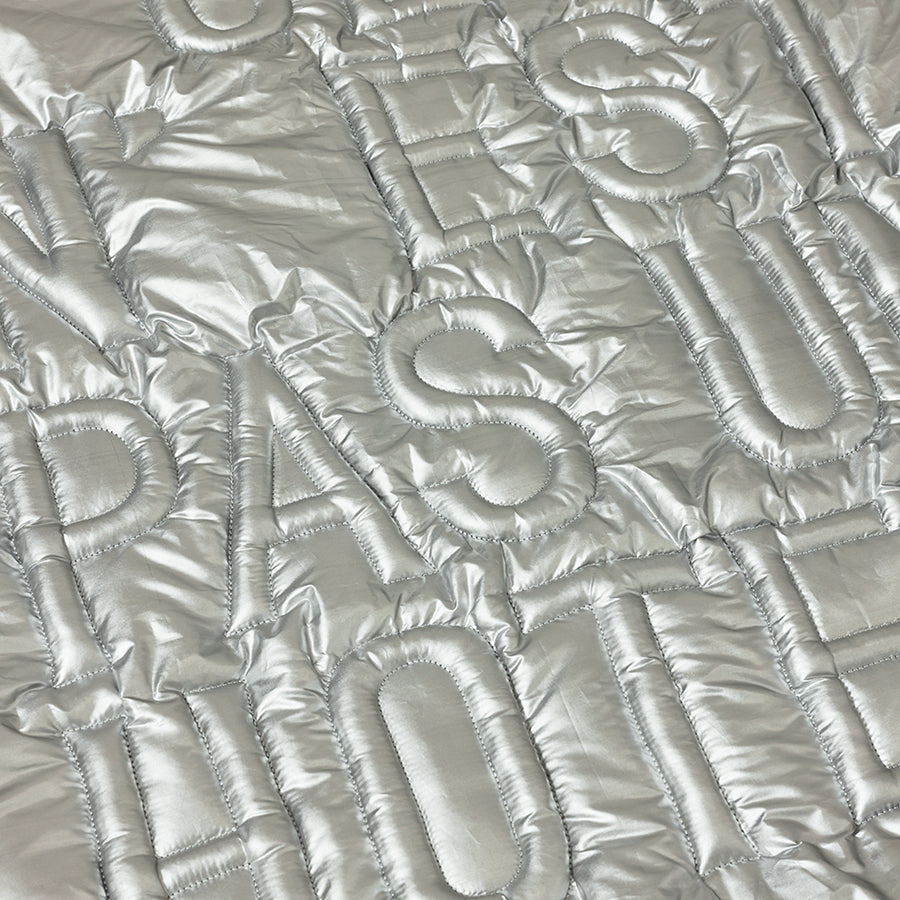 Silver quilted fabric with quilted pattern