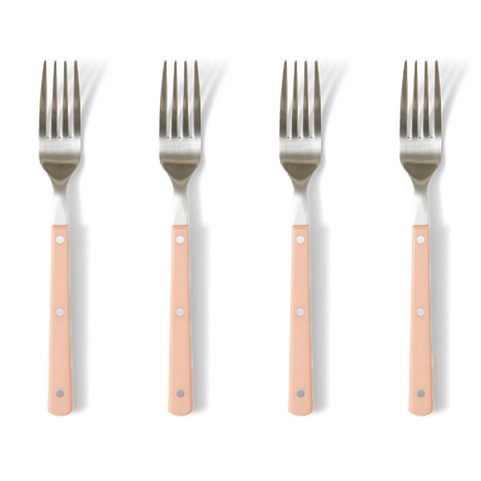 Four forks with pink handles on a white background