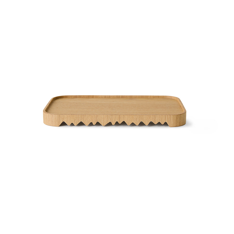 Rectangular wooden tray with wavy edge on a white background