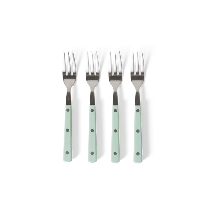 Set of four silver forks with green handles on a white background
