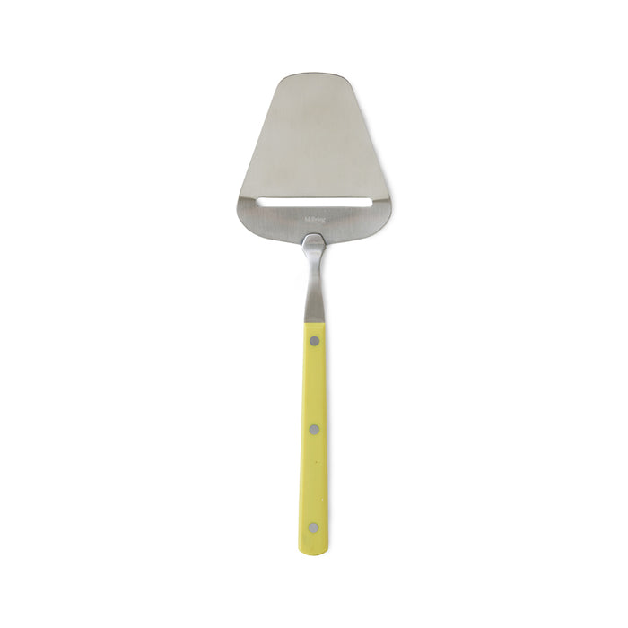 Metal cheese slider with a yellow handle on a white background