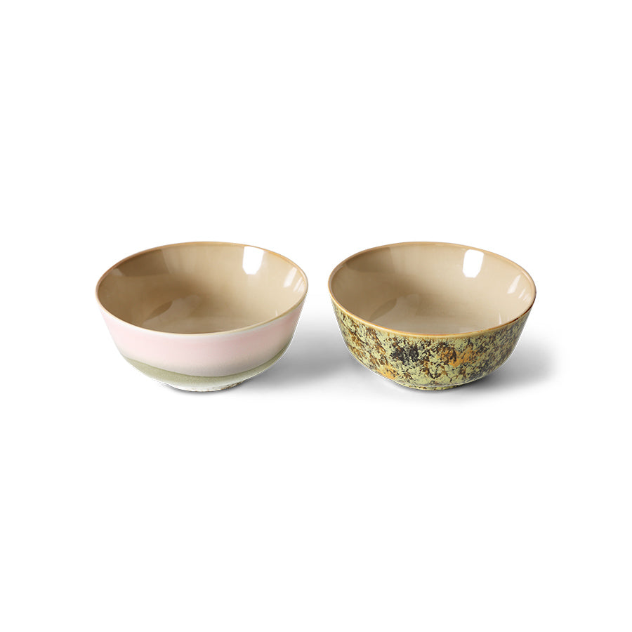 Two ceramic bowls with different patterns on a white background