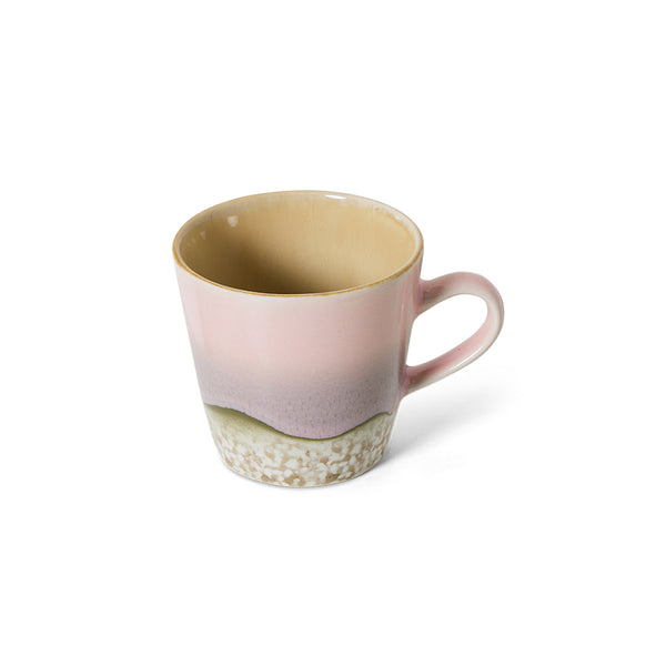 pink toned ceramic mug with ear on white background